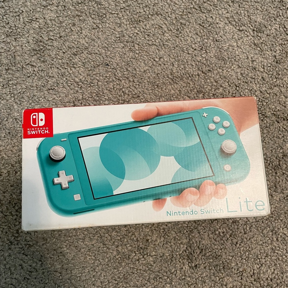 Nintendo Switch Lite in aqua blue color: NEW